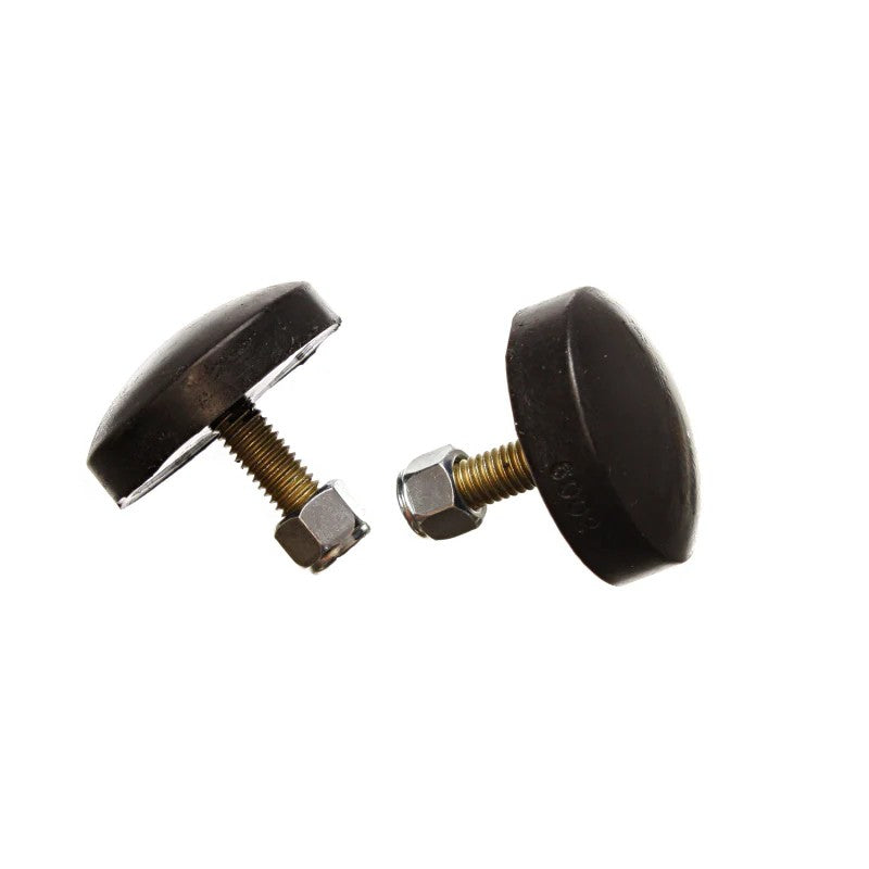 Two black Energy Suspension low profile button-style polyurethane bump stops with integrated mounting studs.