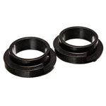 Two black Energy Suspension Hyper-Flex polyurethane coil spring isolators with 2 1/8 inch internal diameter.