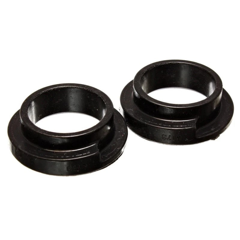 Two black Energy Suspension Hyper-Flex polyurethane coil spring isolators with 2 1/8 inch internal diameter.