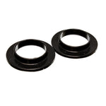 A pair of black Energy Suspension Hyper-Flex polyurethane coil spring isolators with a 2-3/16 inch inner diameter.