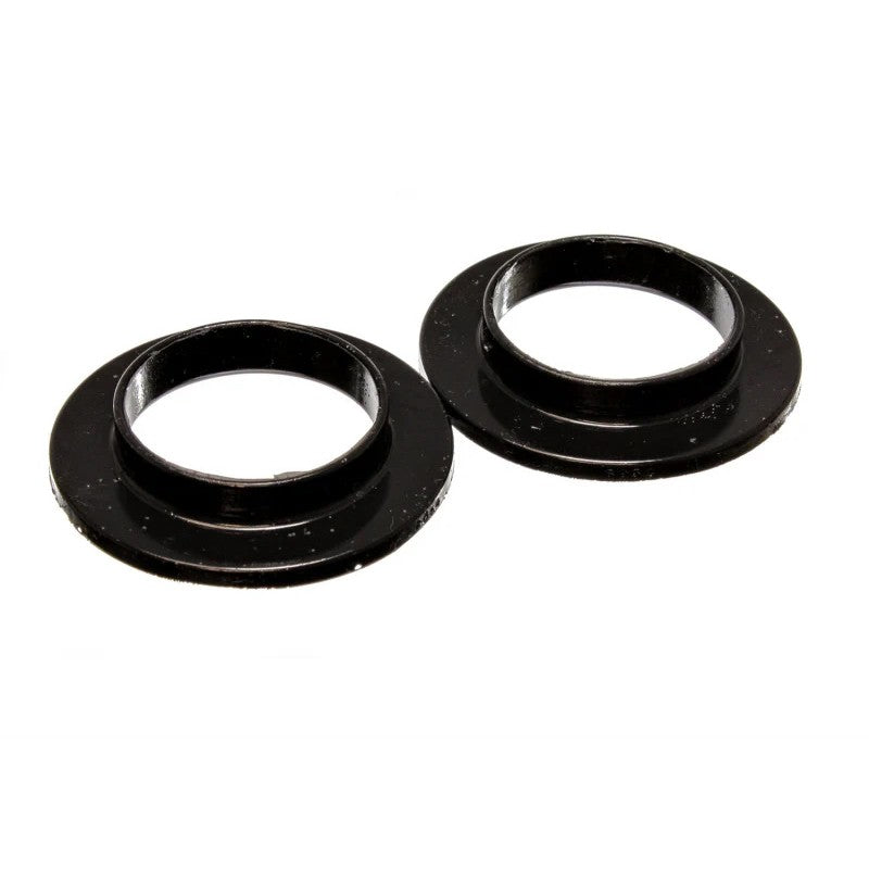 A pair of black Energy Suspension Hyper-Flex polyurethane coil spring isolators with a 2-3/16 inch inner diameter.