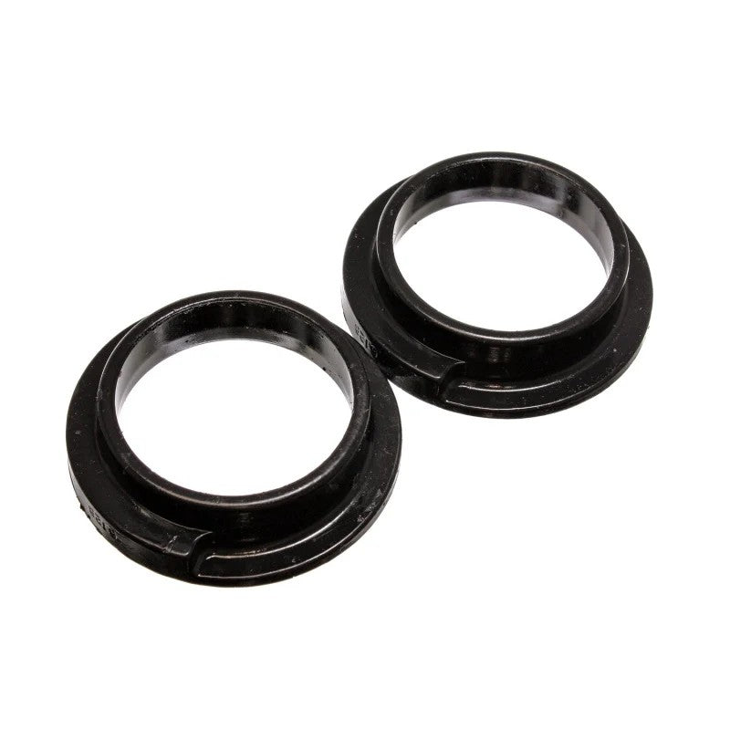 Set of two black Energy Suspension Hyper-Flex polyurethane coil spring isolators, 3 inch ID and 4-5/16 inch OD.