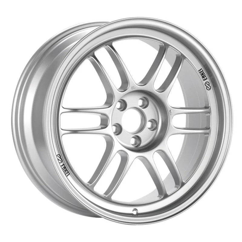 Silver Enkei RPF1 twin-spoke lightweight racing wheel in 14x7 with 4x100 bolt pattern.