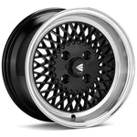 Enkei92 Classic Line 15x7 mesh wheel in black with a machined lip and 4x100 bolt pattern.