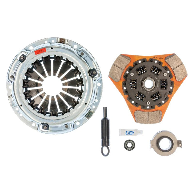 Exedy Stage 2 Cerametallic thick clutch disc featuring a sprung center hub and three-puck friction material pads.