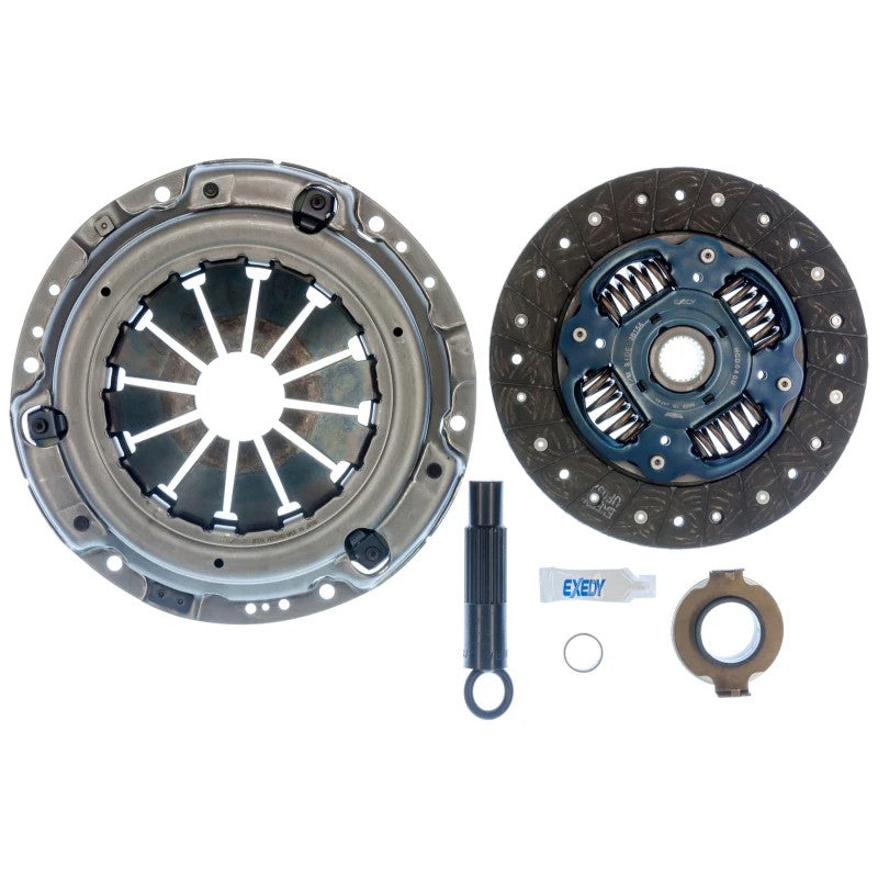 Exedy HCK1005 OE replacement clutch kit with pressure plate, clutch disc, release bearing, and alignment tool.