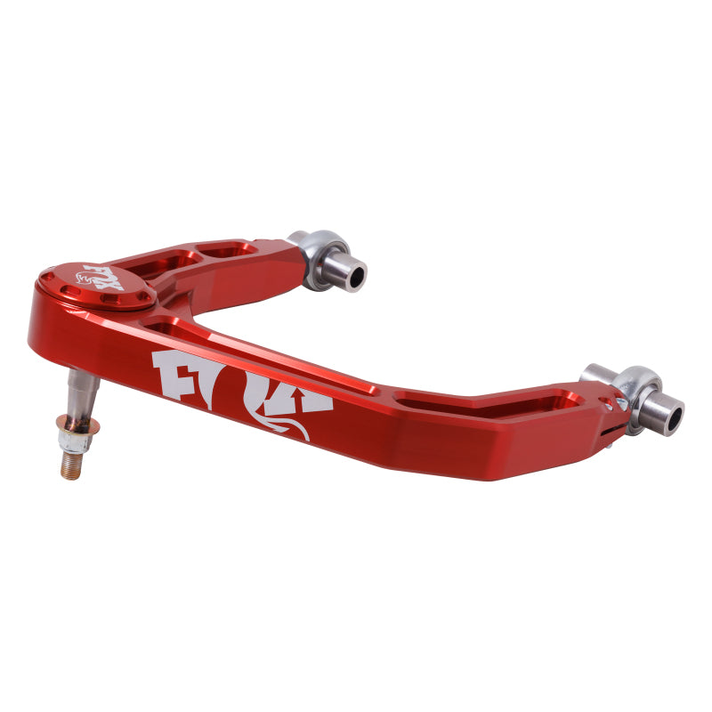 Orange anodized Fox billet aluminum upper control arms with 1.25 inch uniballs and 12-point mounting hardware.
