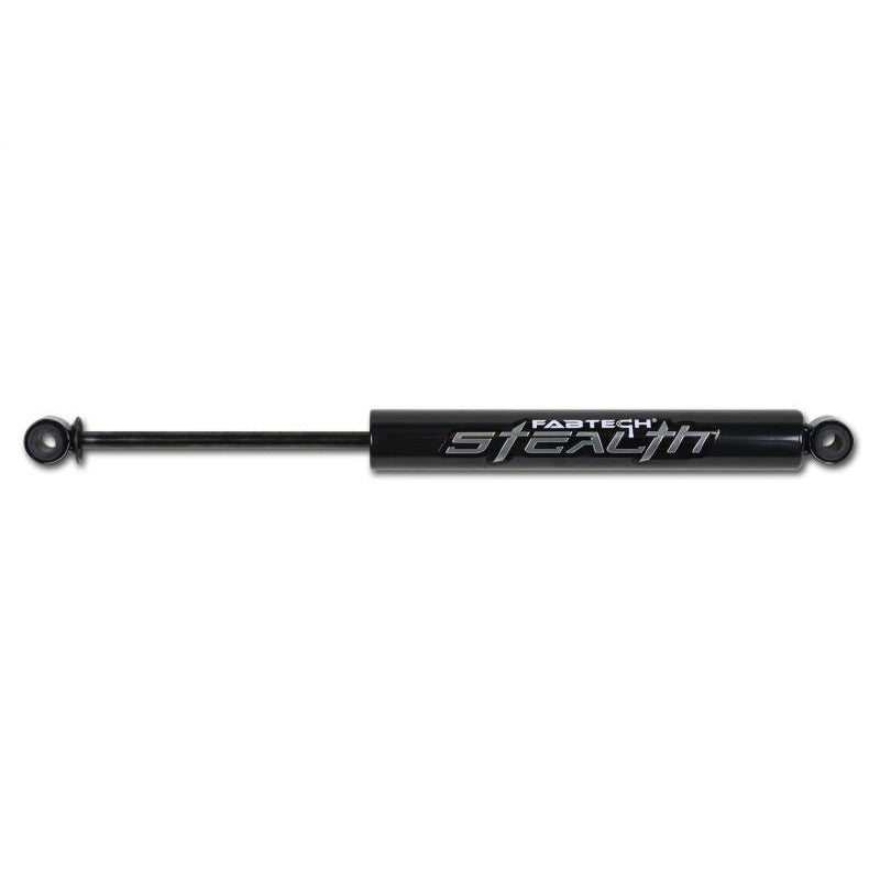 Fabtech Stealth all-black monotube rear shock absorber with raised metal nameplate and matte black Nitrocarb piston rod