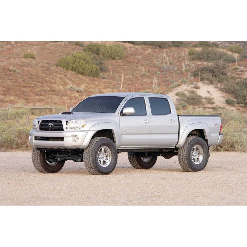 Black Fabtech front 6-inch coilover spacer for 2005-2024 Toyota Tacoma, 4Runner, and FJ Cruiser.