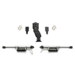 Fabtech dual steering stabilizer system with two Dirt Logic 2.25 reservoir shocks and black mounting hardware.