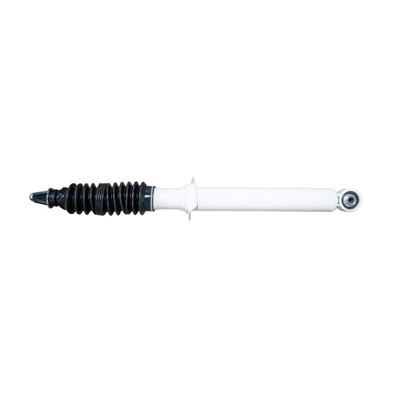 White Fabtech Performance Series twin-tube rear shock absorber with black polyurethane bushings.