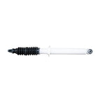 White Fabtech Performance Series twin-tube rear shock absorber with black polyurethane bushings.