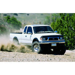 Fabtech FTS200 steel rear add-a-leaf suspension spring featuring a pre-drilled center hole and black finish.