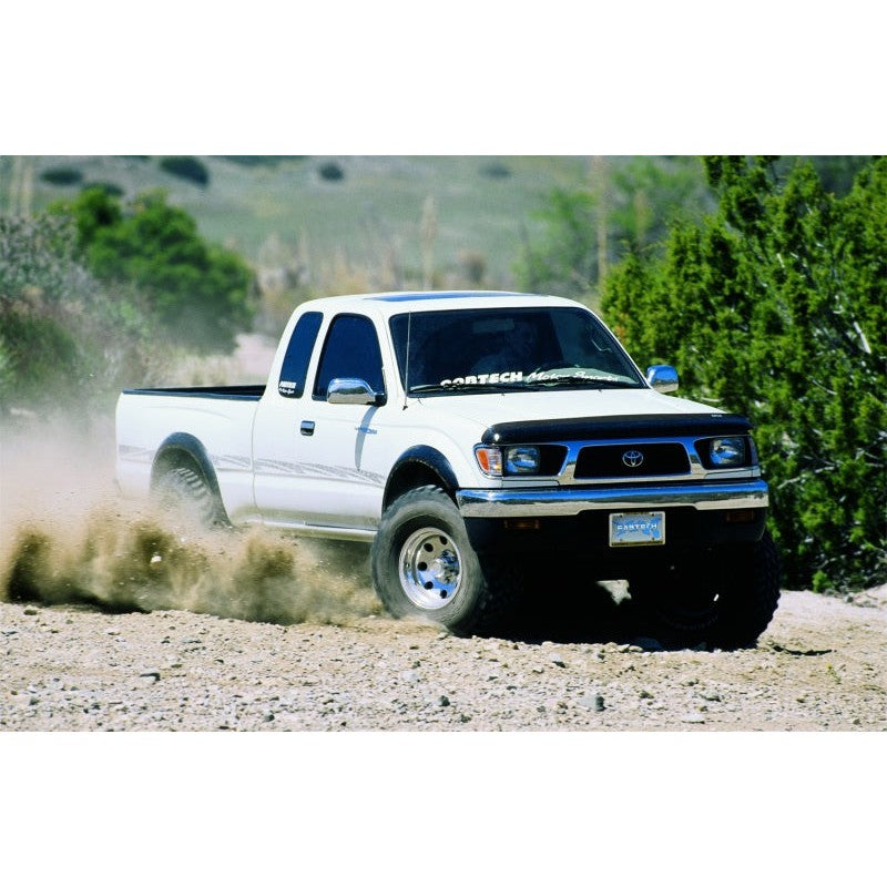 Fabtech FTS200 steel rear add-a-leaf suspension spring featuring a pre-drilled center hole and black finish.