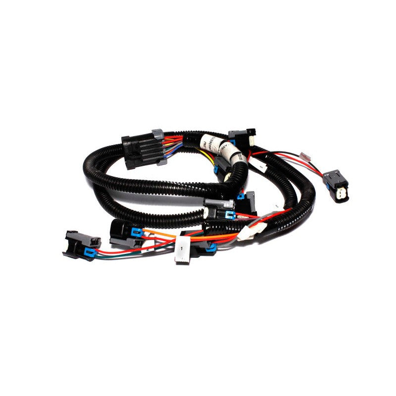 FAST XFI fuel injector wiring harness with black protective loom and multi-pin automotive connectors.