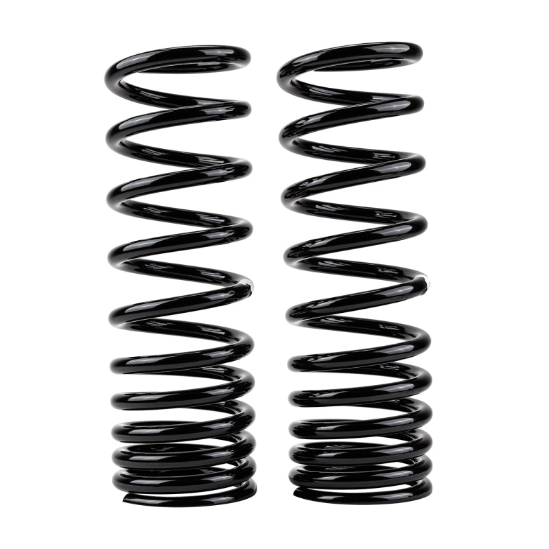Old Man Emu heavy duty rear coil spring with a black powder coat finish.