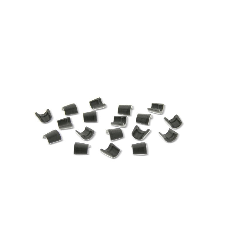 Set of 16 Ferrea K10061 steel valve locks featuring a radial groove design for 6mm Subaru valve stems.