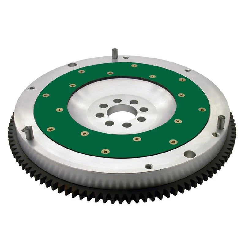 Billet aluminum Fidanza flywheel featuring a replaceable steel friction plate and hardened ring gear.