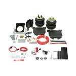 Firestone Ride-Rite air helper springs with onboard compressor and analog gauge for 2001-2010 GM trucks.