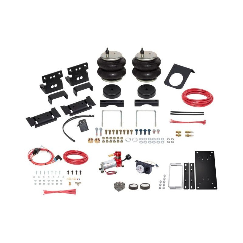 Firestone Ride-Rite All-In-One air spring kit with analog gauge and heavy-duty compressor for Dodge Ram 2500/3500.