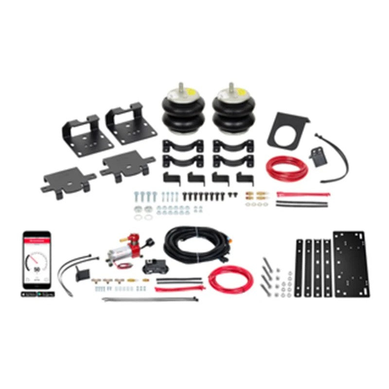 Firestone Ride-Rite air helper springs with wireless compressor and no-drill mounting plate for 2500/3500 HD trucks.