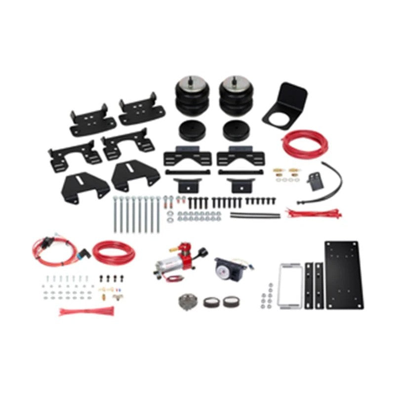Firestone Ride-Rite All-In-One air helper spring kit with air bellows, analog gauge, compressor, and mounting hardware.