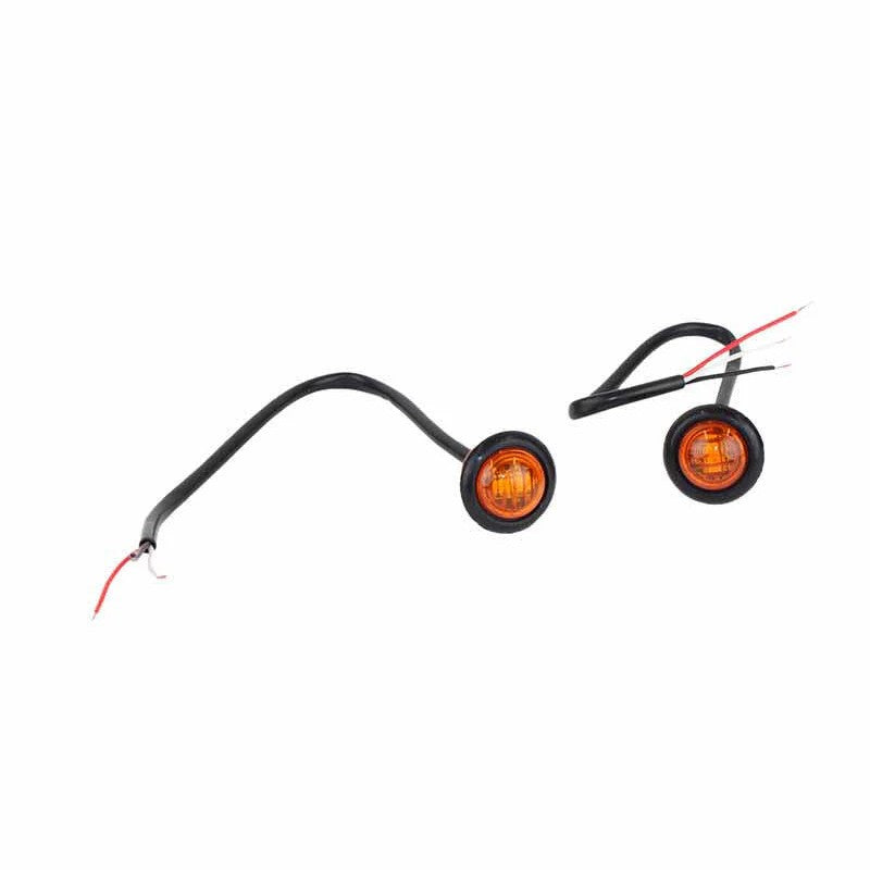 Two Fishbone Offroad 3/4 inch amber LED marker lights with black rubber grommets and three-wire pigtails.