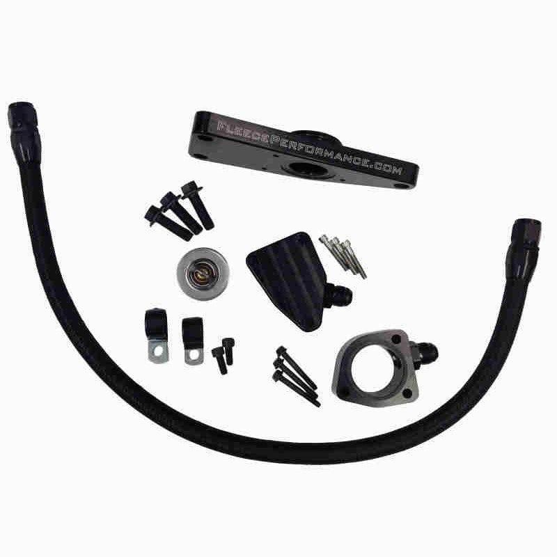 Fleece Performance coolant bypass kit for Cummins engines featuring a braided hose, thermostat housing, and AN fittings.