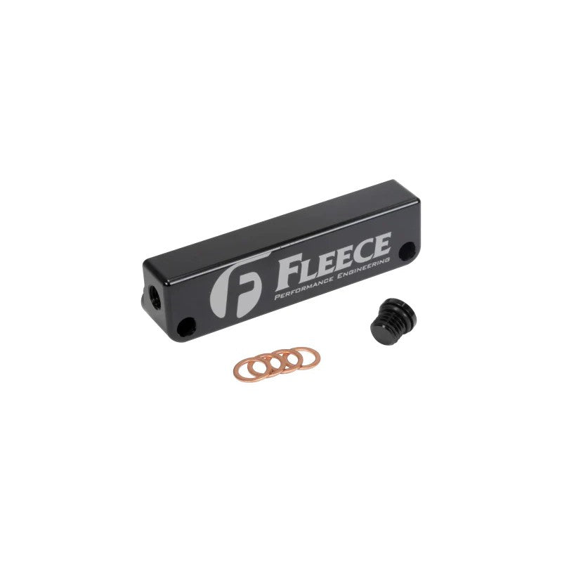 Fleece Performance 4th Gen Fuel Filter Delete block with hardware and sensor port plugs for Dodge Ram Cummins.