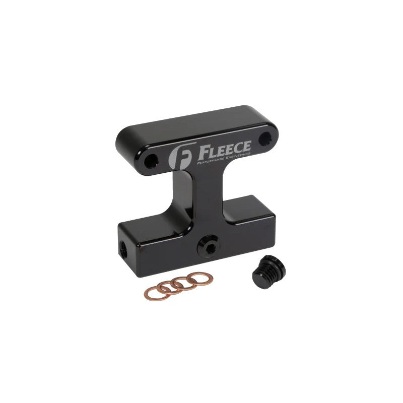 Fleece Performance 3rd Gen Dodge Ram 6.7L Cummins fuel filter delete block with hardware and plugs.
