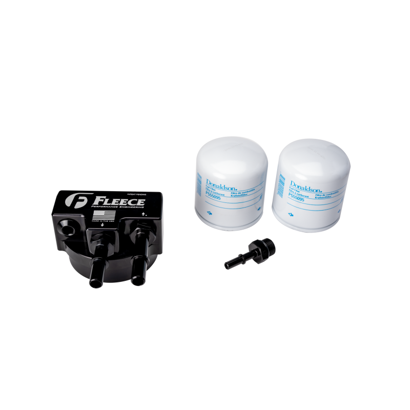 Billet aluminum engine mounted fuel filter assembly with anodized black cap and quick-disconnect fittings.