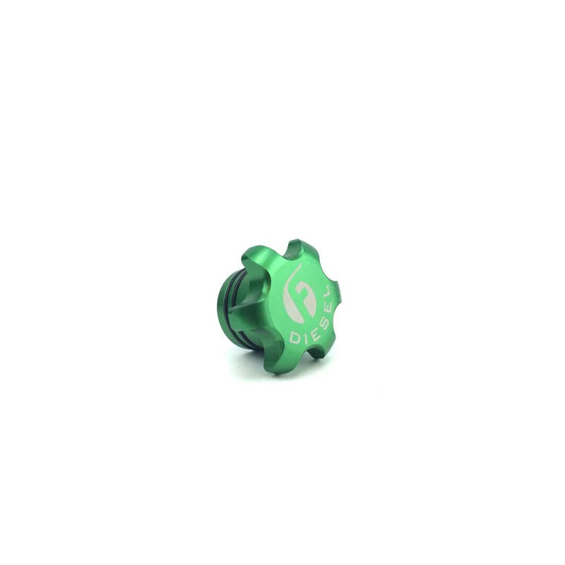 Green anodized billet aluminum fuel cap for Ram trucks featuring double O-rings and a central magnetic base.