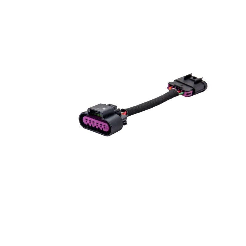 Fleece Performance L5P Duramax fan extension harness with automotive connectors and protective wire sleeving.