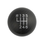 High-gloss carbon fiber shift knob with white 6-speed gear pattern for 2015-2025 Ford Mustang.