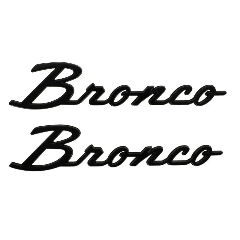 Pair of gloss black Ford Bronco Classic Script fender badges for 2021-2025 models.