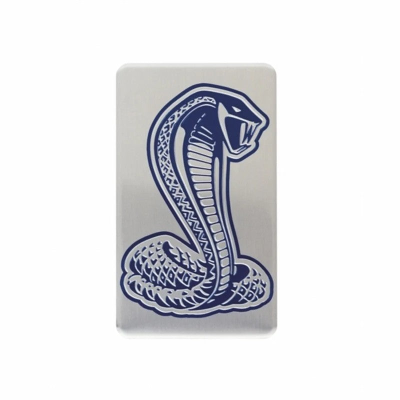 Ford Racing upper intake manifold plaque with blue embossed cobra on brushed aluminum for 1996-1998 Mustang SVT Cobra.
