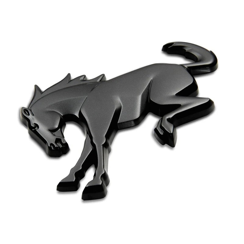 Matte black Ford Racing Bronco rear emblem with pre-applied adhesive backing.