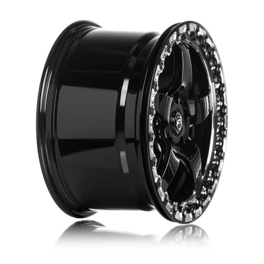 Forgestar D5 Beadlock 18x12 drag racing wheel in gloss black featuring a multi-spoke design and functional beadlock ring.