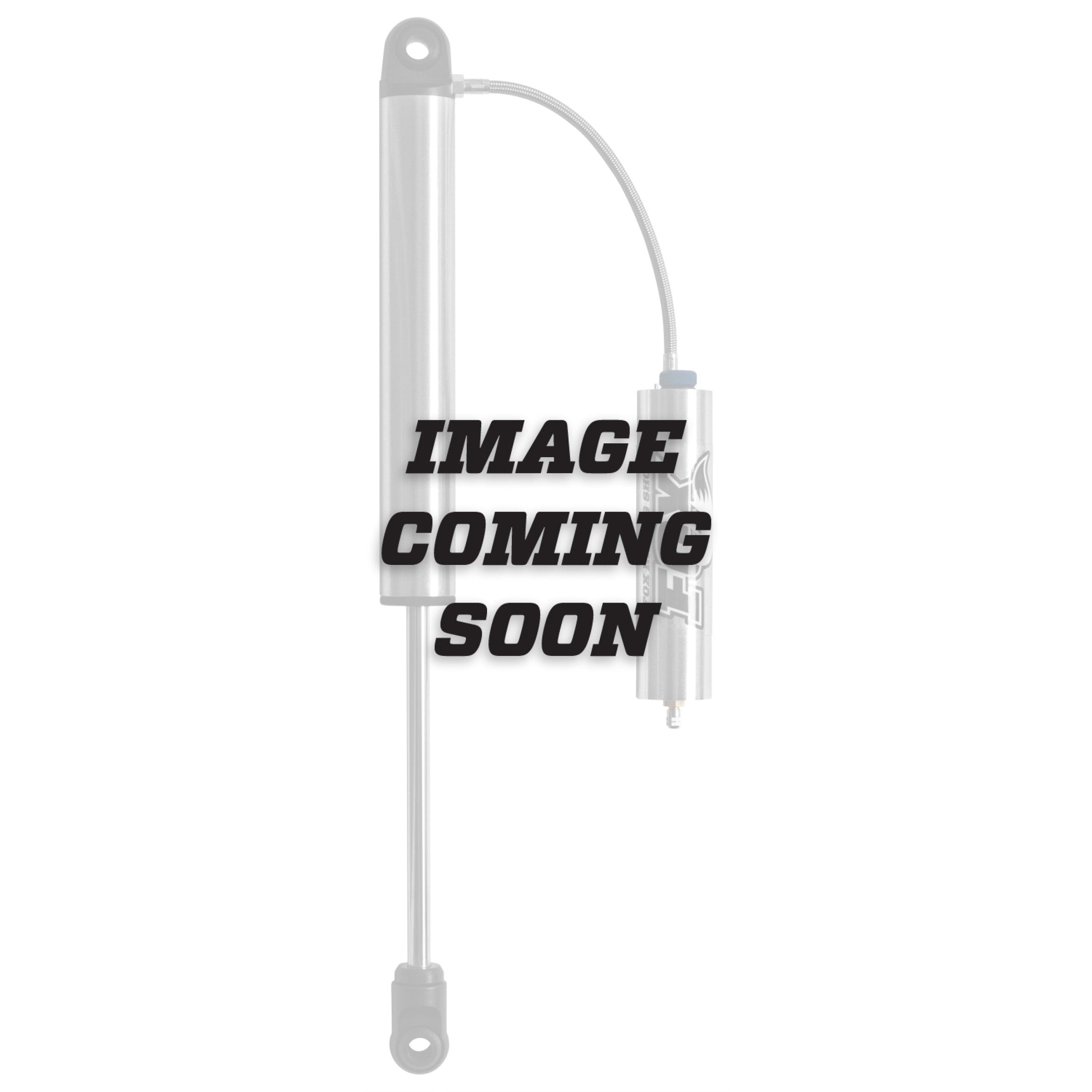 Fox 2.5 Factory Series front coilover shock with remote reservoir and DSC adjuster for 4-6 inch lifted Ram 1500 trucks.