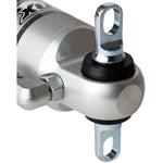 Fox 2.0 Performance Series remote reservoir rear shock with silver aluminum body and black mounting hardware.
