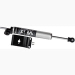 Fox 2.0 Performance Series through-shaft steering stabilizer with black anodized aluminum axle mount components.