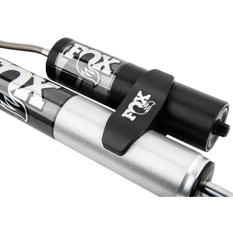 Fox Performance Series 2.0 rear smooth body shock with external reservoir and mounting hardware for GM 2500/3500 HD trucks.