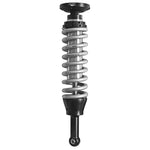 Fox 2.5 Factory Series IFP coilover shock set with upper control arms featuring zinc plated bodies and black hardware.
