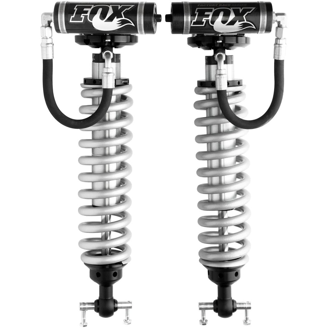 Fox 2.5 Factory Series remote reservoir coilovers with silver zinc-plated bodies and black anodized aluminum components.