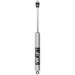 Fox 2.0 Performance Series rear IFP shock with clear-anodized aluminum body and black CNC-machined mounting components.