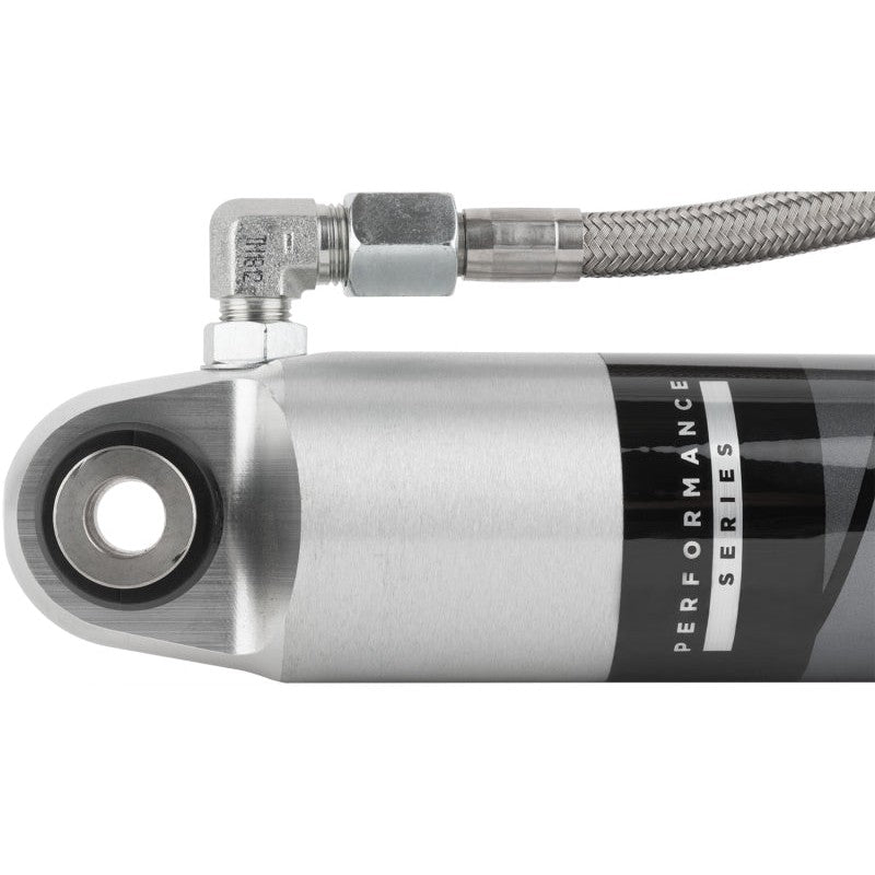 Fox 2.0 Performance Series Smooth Body IFP rear shock with clear-anodized aluminum body and black components.