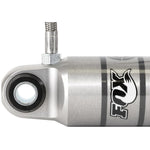 Fox 2.0 Performance Series remote reservoir rear shock with aluminum body and reservoir clamp for Dodge Ram trucks.