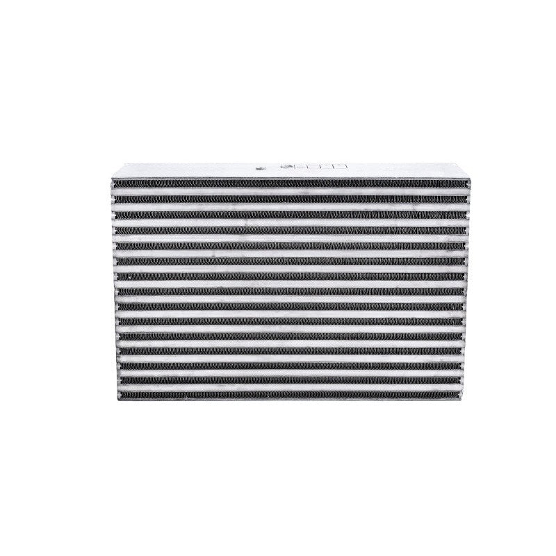 Garrett bar-and-plate air-to-air intercooler core with raw aluminum finish and visible internal cooling fins.