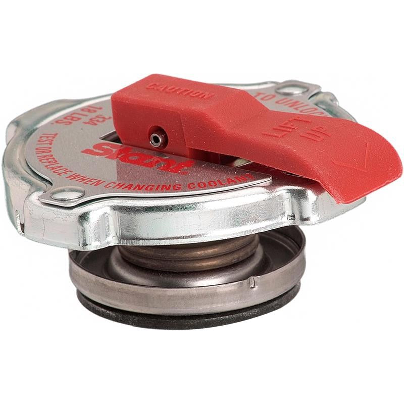 Gates 31535 safety release radiator cap with red pressure lever and 18 psi stamp on a silver metal finish.
