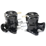 Two GFB Hybrid TMS Dual Port blow off valves with block-off plugs for Nissan GT-R R35.